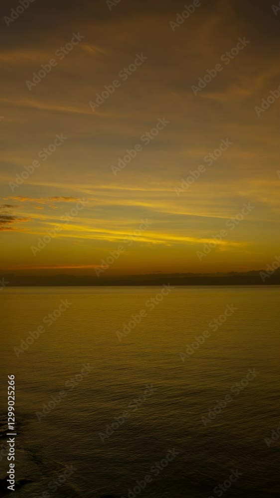 Sea surface during a beautiful colourful sunset, timelapse. Vertical video 4k Sea surface during a beautiful colourful sunset, timelapse. Vertical video 4k