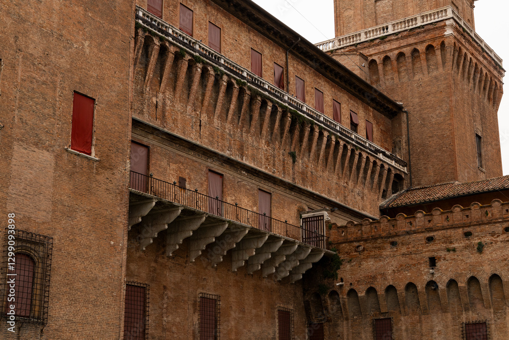 Fototapeta premium Ferrara, Ferrara,Italy March 29 2024 historic center, fortifications and castle surrounded by a moat. Squares and buildings in medieval style.Beautiful, unique Italian cities. World cultural heritage.