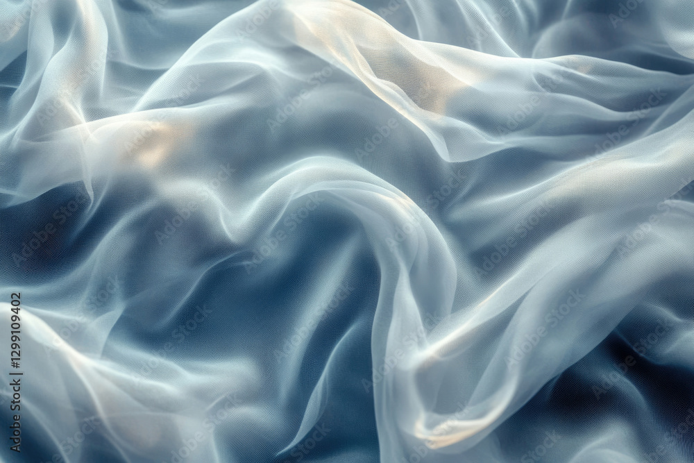 Fototapeta premium Soft, flowing light blue chiffon fabric with delicate folds and translucent texture.