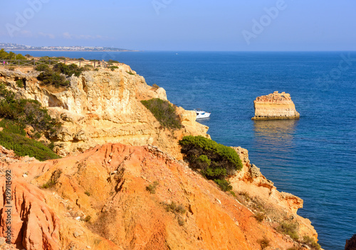 walking path with breathtaking views through the coast from porches to benagil caves lagoa algarve portugal