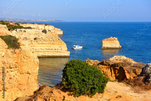walking path with breathtaking views through the coast from porches to benagil caves lagoa algarve portugal