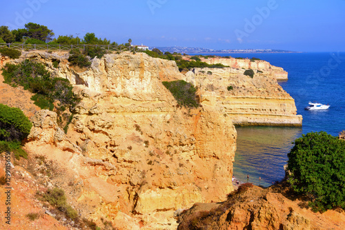 walking path with breathtaking views through the coast from porches to benagil caves lagoa algarve portugal