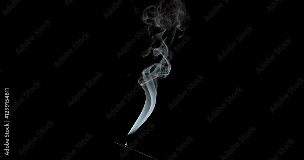 Real smoke on a black background. Thin Flexible Trickle of Real Smoke. Colorful real smoke rises up. Ideal for background or over-layer with blending mode add, screen, lighten. Real smoke on a black background. Thin Flexible Trickle of Real Smoke. Colorful real smoke rises up. Ideal for background or over-layer with blending mode add, screen, lighten.