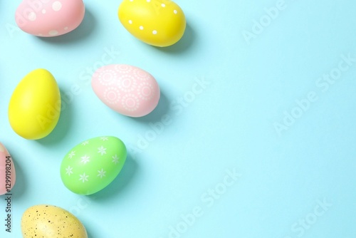 Happy Easter. Colorful eggs on color background, space for text or advertising photo