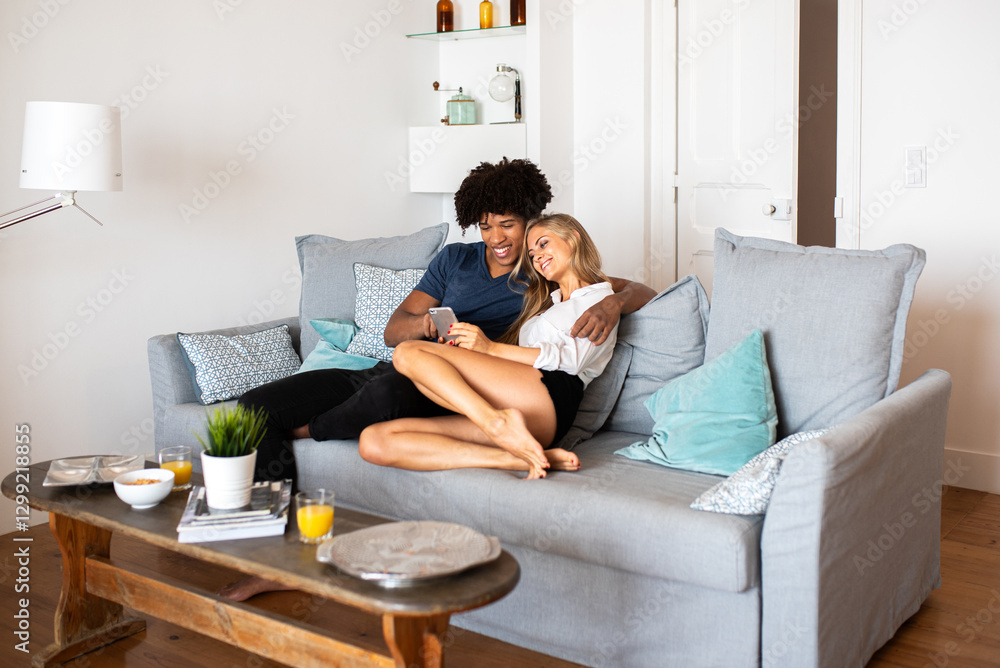 Relaxed couple enjoying cozy quality time on a sofa