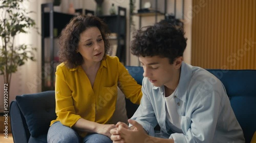 Wallpaper Mural Caring mother comforting and supporting her upset teenage son, parental love Torontodigital.ca