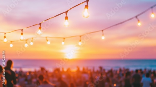 Fototapeta Naklejka Na Ścianę i Meble -  Beach sunset gathering with string lights and ocean view for relaxed summer vacation atmosphere