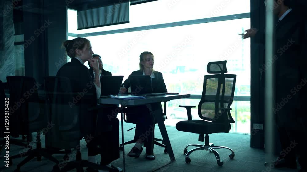 In the conference room, a group of businesspeople are discussing the follow-up meeting and the results of operations In the conference room, a group of businesspeople are discussing the follow-up meeting and the results of operations