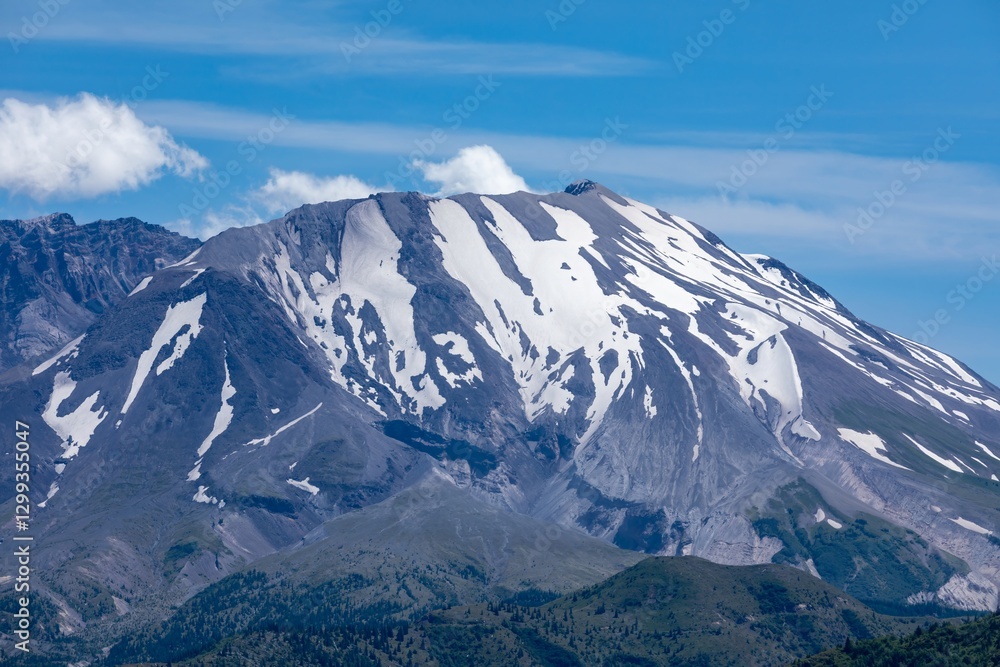 Majestic snow-capped mountain peak under a clear blue sky. Nature's grandeur. Mount St. Helens National Volcanic Monument, Washington, USA Majestic snow-capped mountain peak under a clear blue sky. Nature's grandeur. Mount St. Helens National Volcanic Monument, Washington, USA