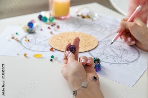 Εκτύπωση καμβά Woman astrologer draws a natal chart. Selective focus