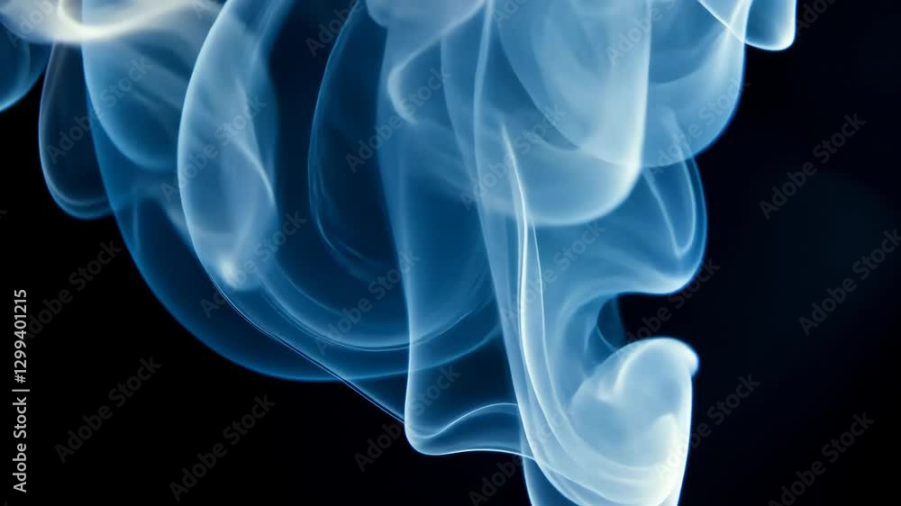Swirling delicate blue smoke rising gracefully against a dark background Swirling delicate blue smoke rising gracefully against a dark background