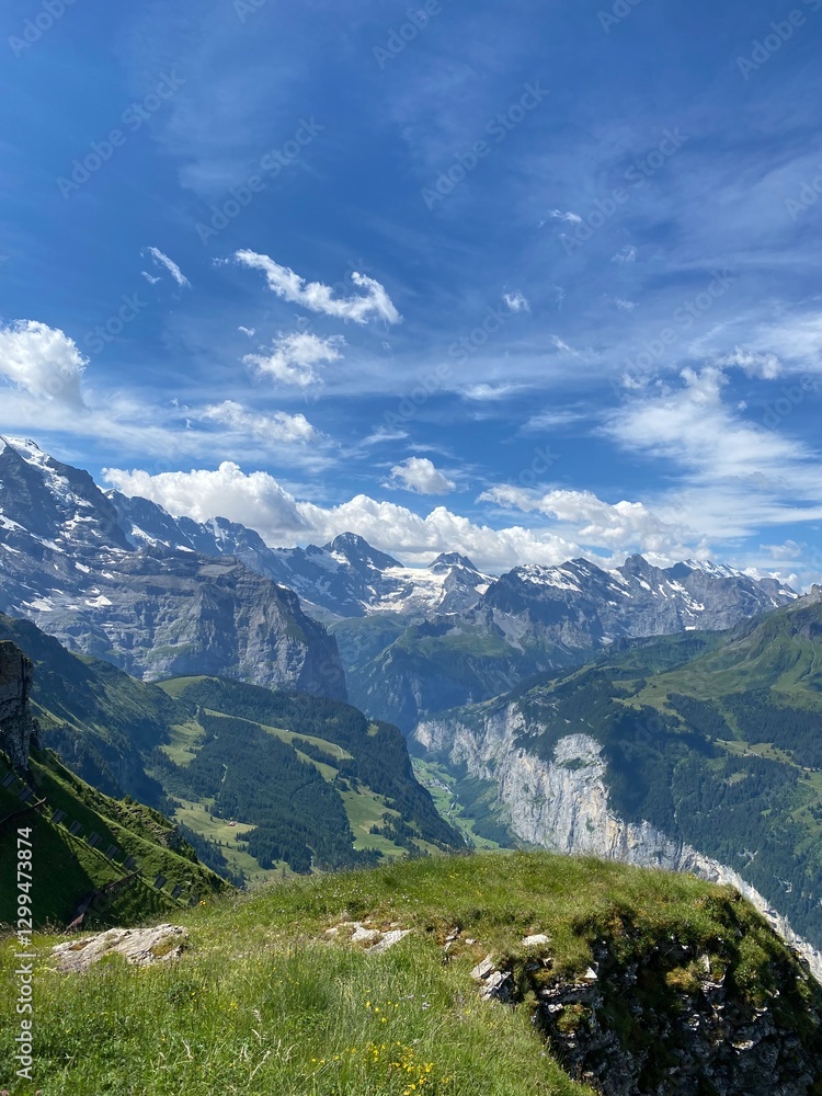 Fototapeta premium A heavenly panorama of the swiss alps during the summer
