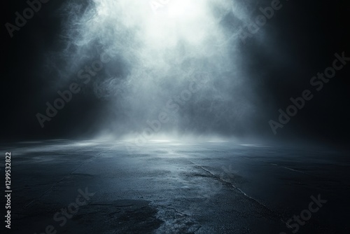 Misty spotlight illuminates a dark concrete stage or floor