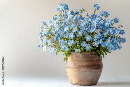 Wallpaper Mural A rustic wooden pot filled with a vibrant bouquet of delicate blue forget-me-not flowers. Torontodigital.ca