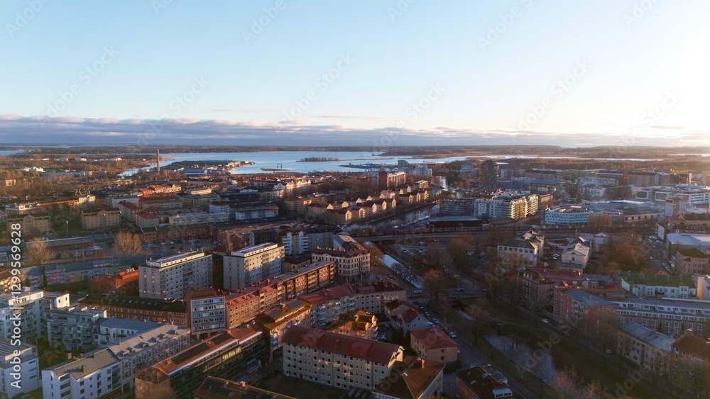Fototapeta premium Aerial View of Karlstad, Sweden at Sunset with Cityscape and Waterways 