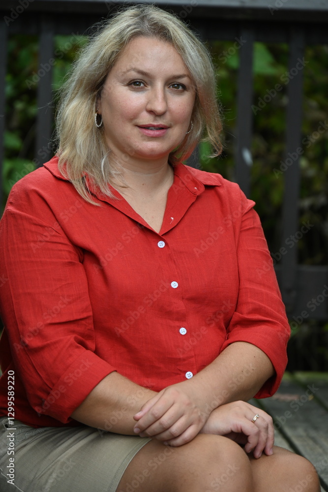 Obraz premium middle-aged blonde woman on nature background