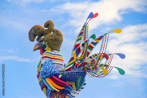 The iconic giant rooster sculpture decorates Recife's Carnival in Brazil with vibrant colors and intricate details.