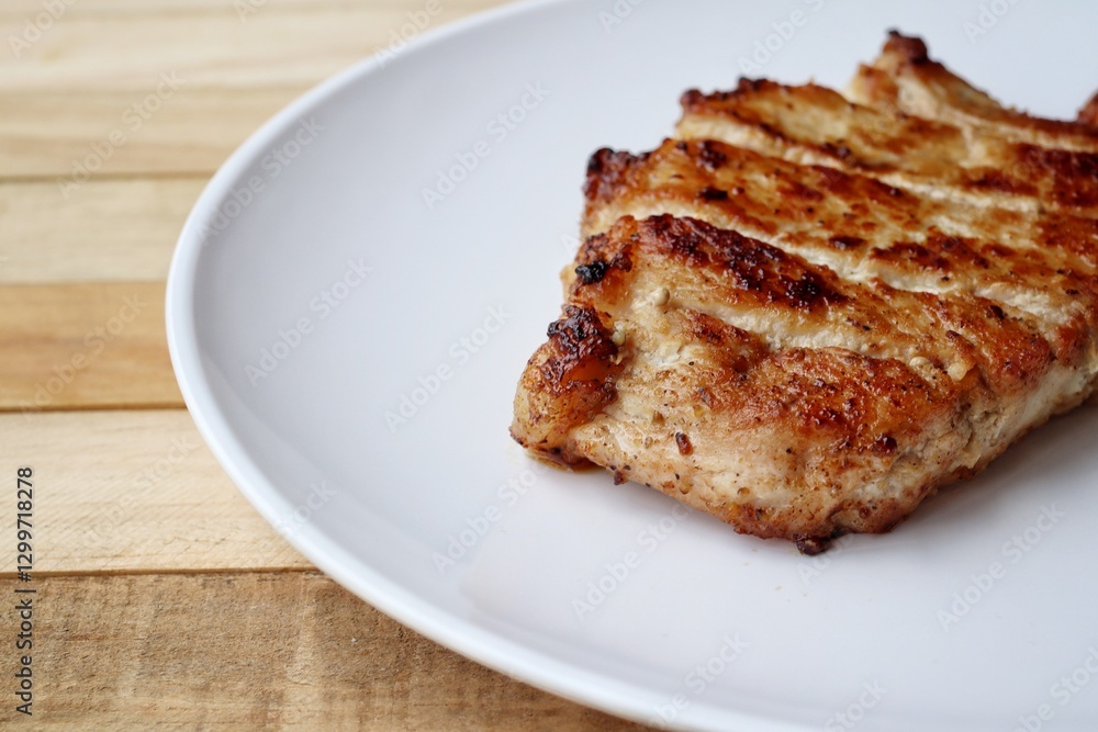 Pork steak grilled barbecue on the plate Pork steak grilled barbecue on the plate
