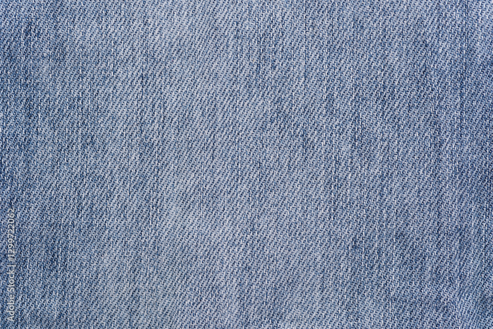 Naklejka premium Washed denim texture background