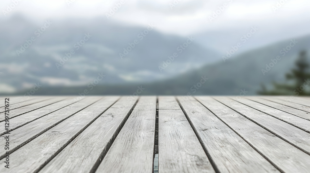 Grey Weathered Wooden Deck Against Misty Mountain Background Grey Weathered Wooden Deck Against Misty Mountain Background
