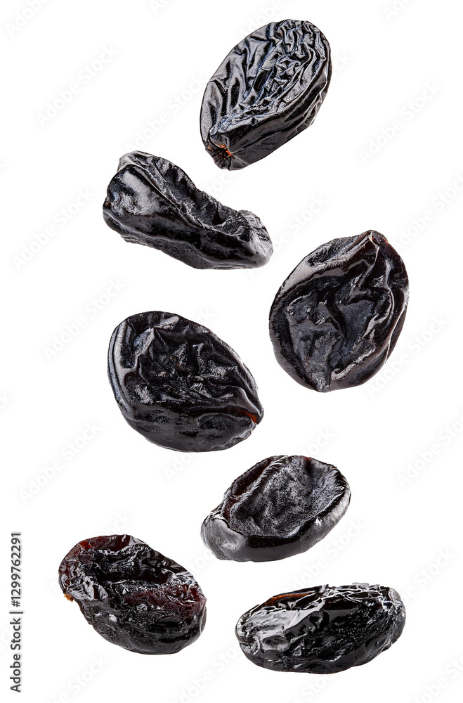 Dried Pruness falling apart, isolated on white background. Dried Pruness falling apart, isolated on white background.
