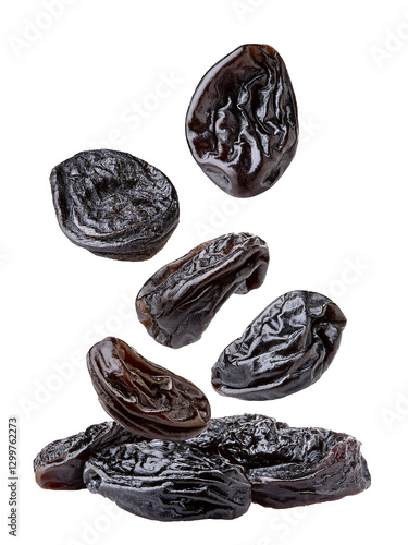 Dried Pruness falling apart, isolated on white background.