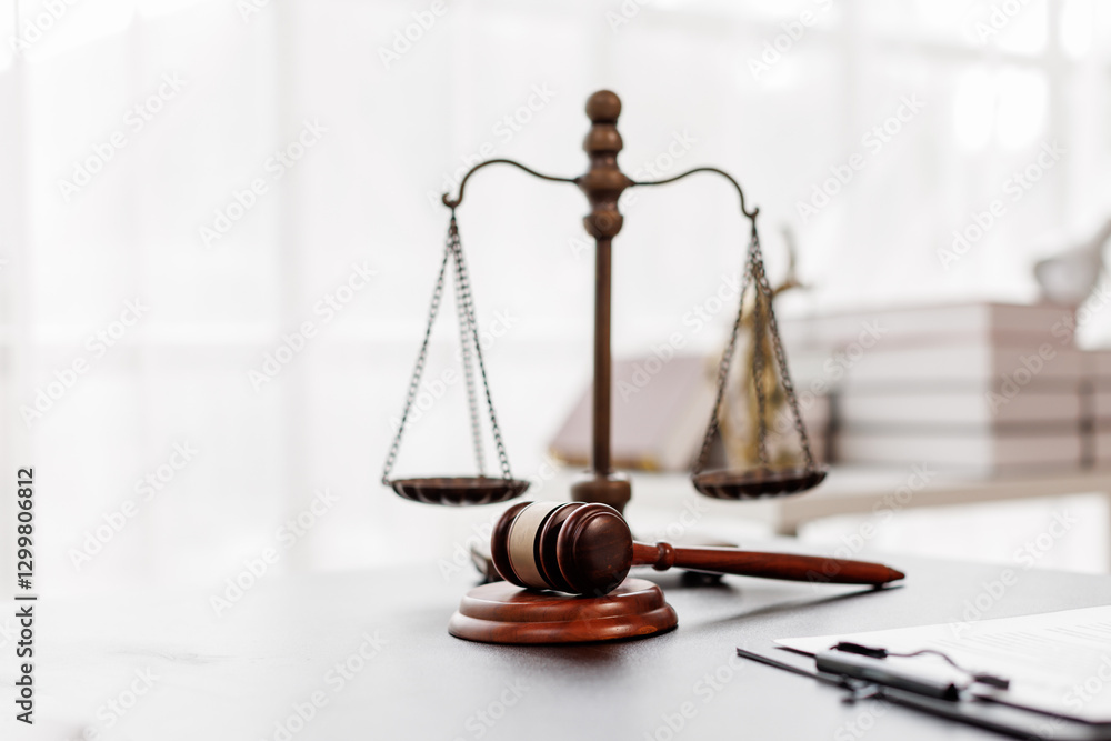 Justice statue, gavel, with LAW Justice lawyers having team meeting at law firm background. Concepts of Law and Legal services.
Justice statue, gavel, with LAW Justice lawyers having team meeting at law firm background. Concepts of Law and Legal services.