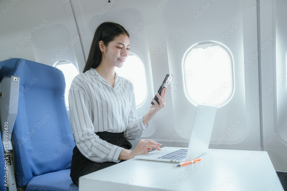 Fototapeta premium A businesswoman sits by the airplane window. She enjoys a luxurious travel experience that symbolizes success, adventure, and the excitement of traveling to new destinations.