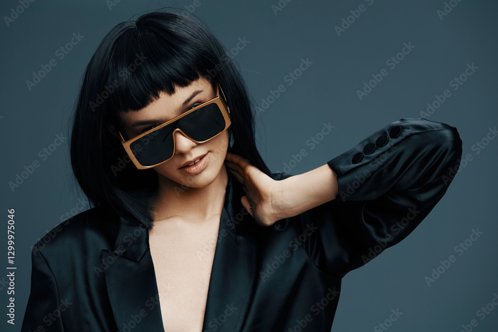 Woman, black hair, sunglasses, black blazer, gray background a woman with black hair wearing stylish sunglasses and a sleek black blazer stands confidently against a minimalist gray background Woman, black hair, sunglasses, black blazer, gray background a woman with black hair wearing stylish sunglasses and a sleek black blazer stands confidently against a minimalist gray background