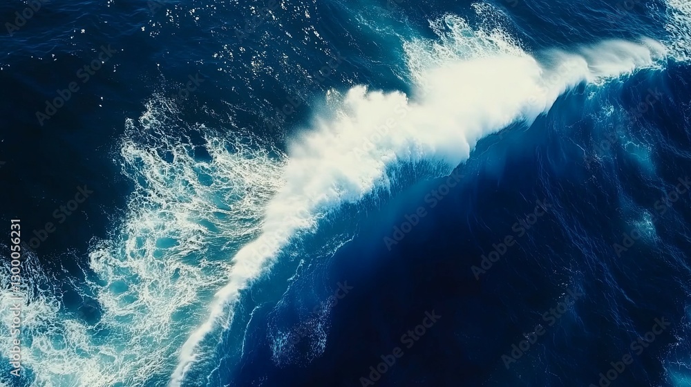 Ocean Wave: Dramatic Aerial View of a Breaking Wave in Deep Blue Ocean Wave: Dramatic Aerial View of a Breaking Wave in Deep Blue