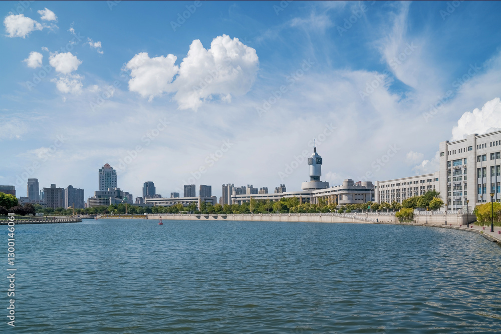 Obraz premium The urban architectural skyline, modern bridges, and Haihe River scenery of Tianjin, China on August 11, 2024
