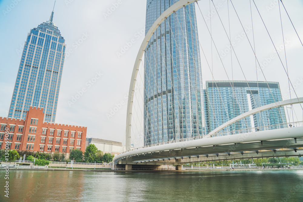 The urban architectural skyline, modern bridges, and Haihe River scenery of Tianjin, China on August 11, 2024 The urban architectural skyline, modern bridges, and Haihe River scenery of Tianjin, China on August 11, 2024