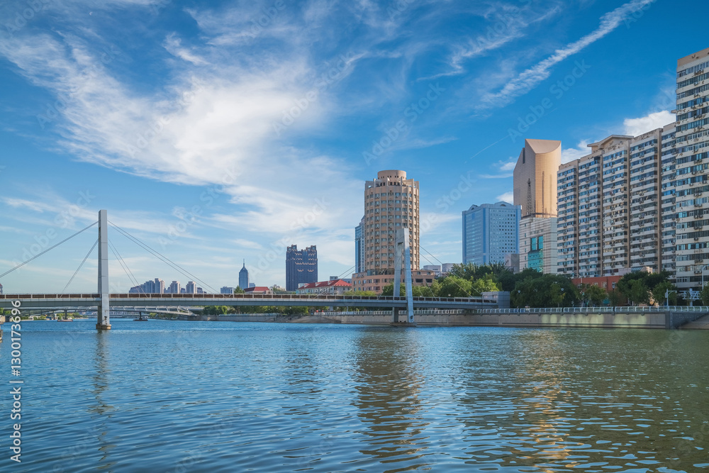 The urban architectural skyline, modern bridges, and Haihe River scenery of Tianjin, China on August 11, 2024 The urban architectural skyline, modern bridges, and Haihe River scenery of Tianjin, China on August 11, 2024