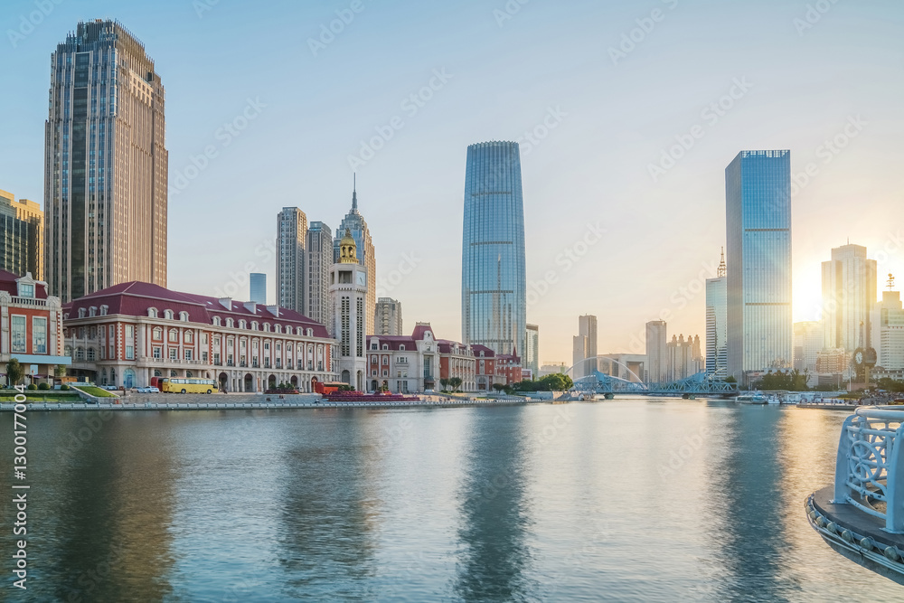 Obraz premium The urban architectural skyline, modern bridges, and Haihe River scenery of Tianjin, China on August 11, 2024