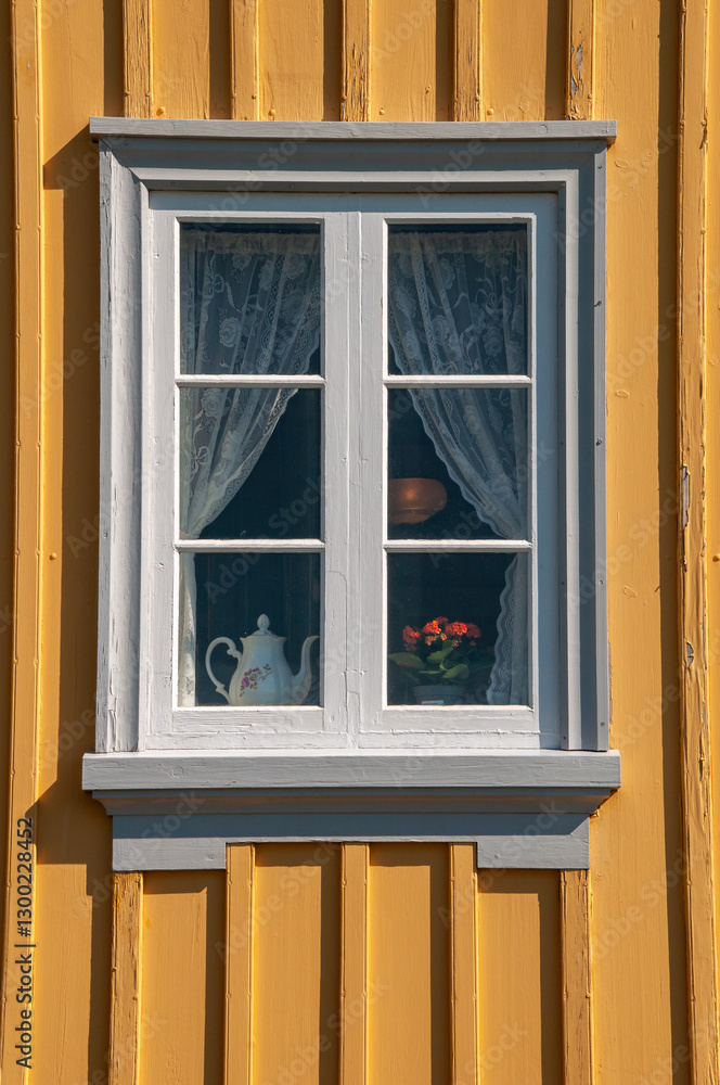 Fototapeta premium Glaumbaer Iceland, window with curtains and knick-knacks