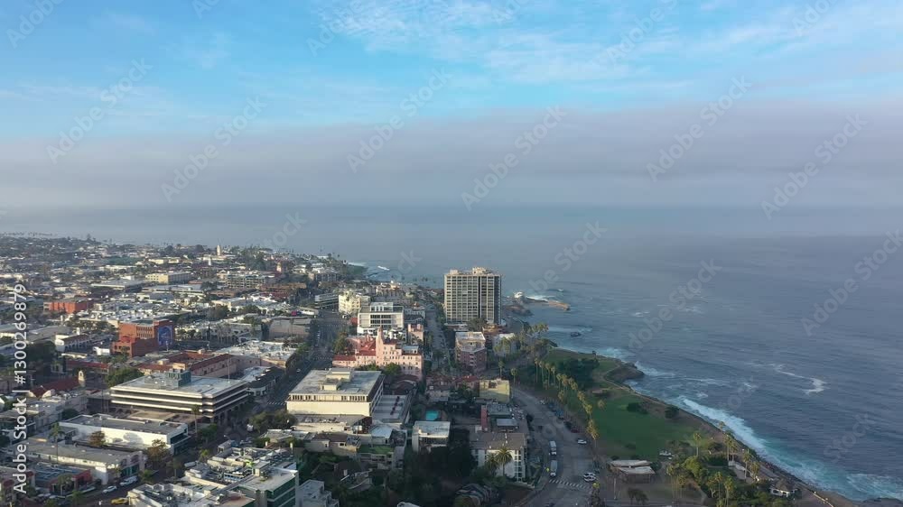 The Affluent Coastal Town of La Jolla California, aerial drone backwards. The Affluent Coastal Town of La Jolla California, aerial drone backwards.
