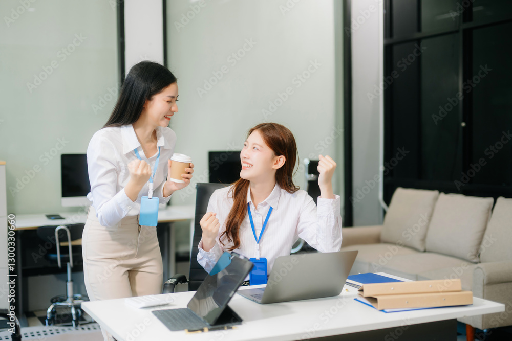 Businesswoman leading team meeting and using tablet and laptop computer with financial Businesswoman leading team meeting and using tablet and laptop computer with financial