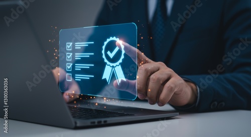 Digital assurance interface being touched by hand, laptop in focus, soft lighting
