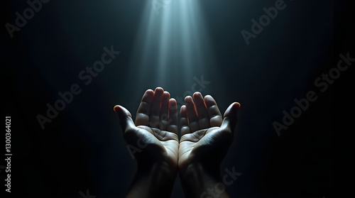 Praying Hands Reaching Up to Divine Light Rays in Dark Setting - Spiritual Hope Faith Prayer Guidance Blessing Receiving God's Light From Above