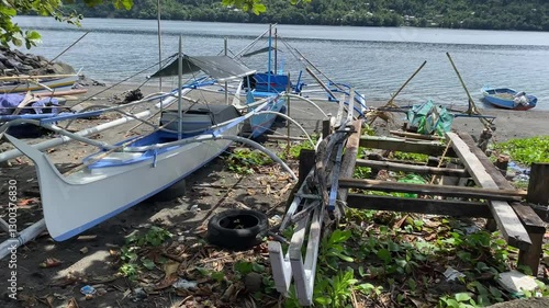 beach atmosphere with traditional boats from the Sangihe tribe, North Sulawesi province, Indonesia. pumb boat, February 8th 2024