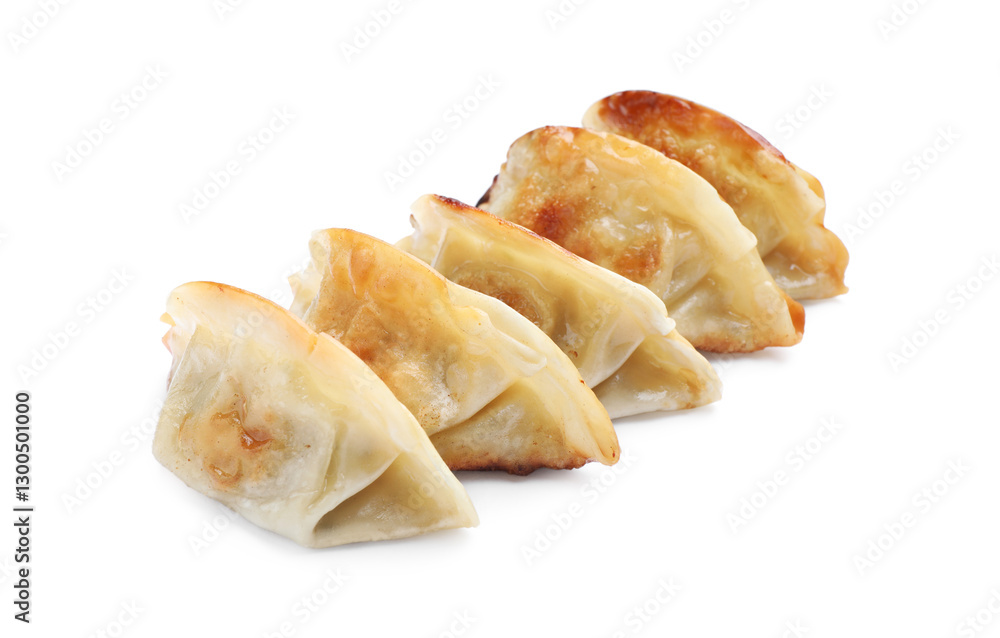 Delicious fried gyoza dumplings isolated on white Delicious fried gyoza dumplings isolated on white