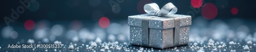 Glitter silver gift box with a sprinkle of snowflakes around it, silver, snowflakes