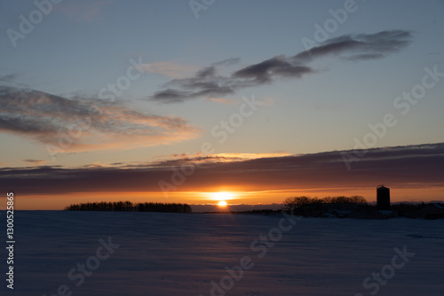 Sunrise over snow field in Hokkaido japan