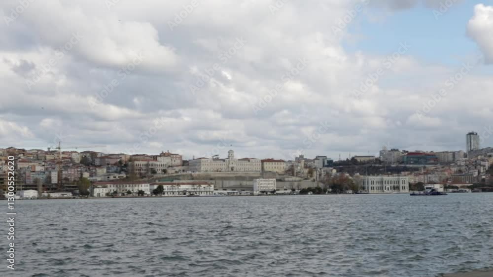 Istanbul cityscape, mosque domes and minarets at sunset, scenic harbor with ships and water. Istanbul cityscape, mosque domes and minarets at sunset, scenic harbor with ships and water.