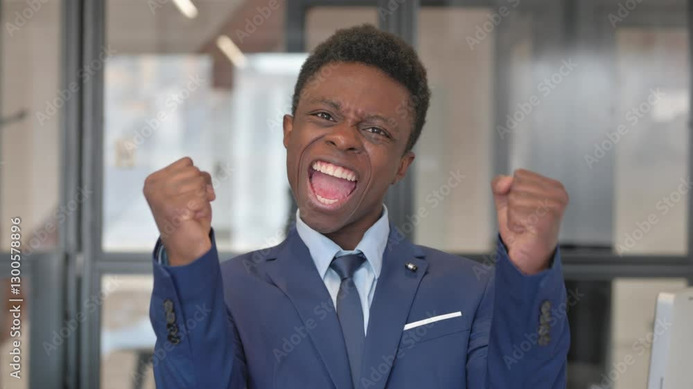 Portrait of African Businessman Celebrating Success Portrait of African Businessman Celebrating Success