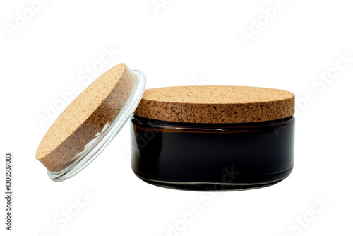 Amber Glass Jar with Cork Lid Isolated on Black Background