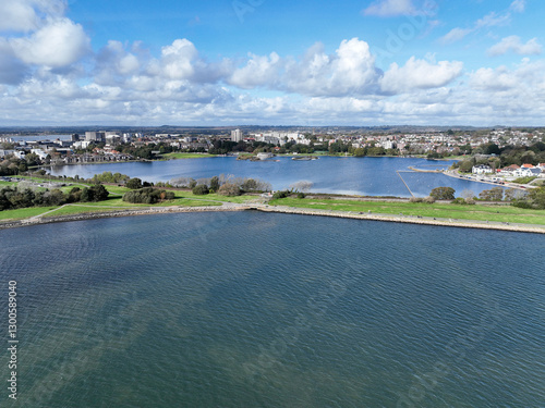an aerial picture of Poole Park lake and part of Poole Harbour on a sunny summers day