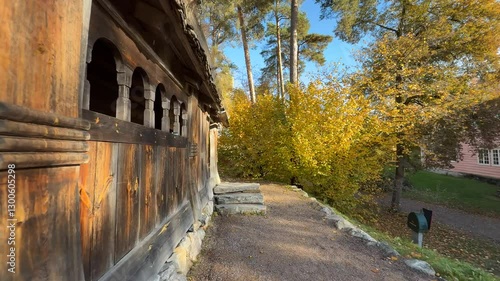 4k video of the side of an old house in a Norwegian village on an autumn day.