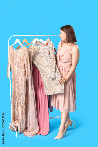 Young woman choosing prom d...