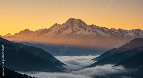 Majestic Mountains Golden Peaks at Sunset Above Clouds